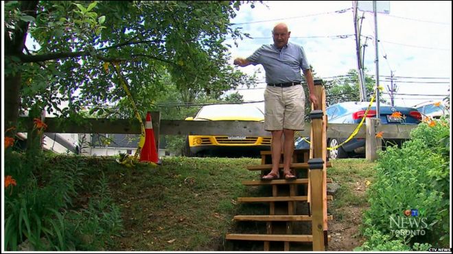 Adi Astl on the stairs he built in a Toronto park