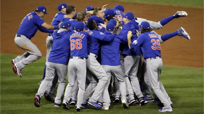 The Chicago Cubs celebrate after Game 7 of the Major League Baseball World Series against the Cleveland Indians Thursday, Nov. 3, 2016, in Cleveland.