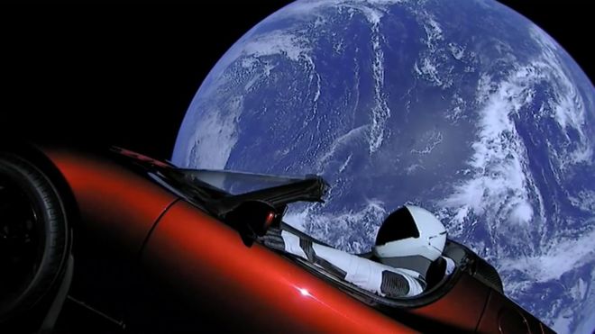 Elon Musk red car and dummy driver for space