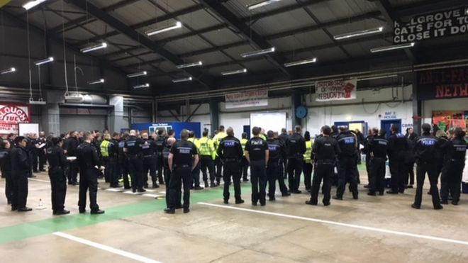Police briefing before raids