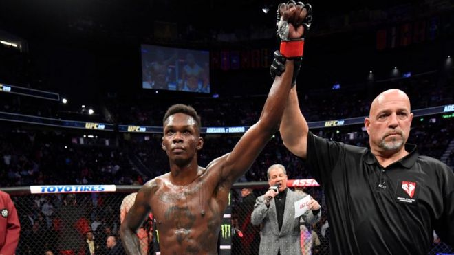 Image result for Nigerian-Born Israel Adesanya Beats Yoel Romero To Remain UFC Middleweight Champion