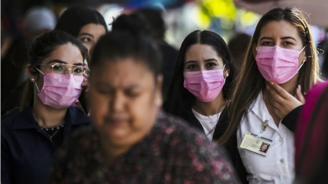Mujeres con mascarilla en Sinaloa.