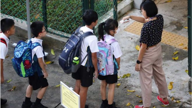 Children going to school in Singapore