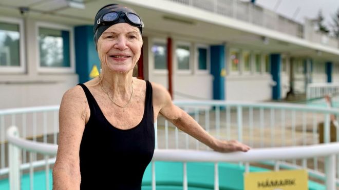 Woman in swimming pool in Iceland