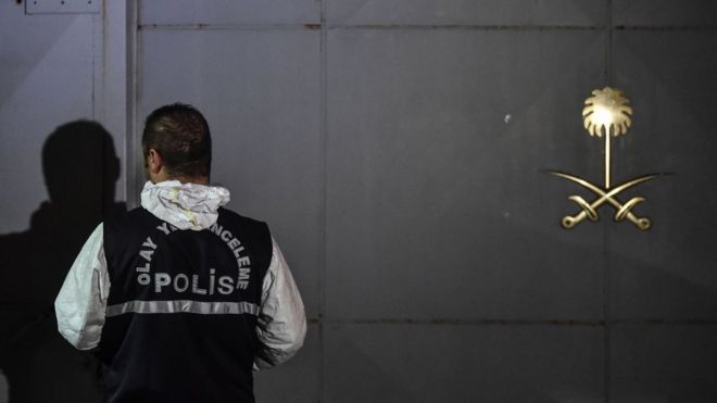 A Trukish forensic officer waits outside the Saudi Arabian consulate in Istanbul 17 October 2018