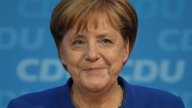 German Chancellor and leader of the German Christian Democrats (CDU) Angela Merkel speaks to the media after meeting with Horst Seehofer on 3 July 2018