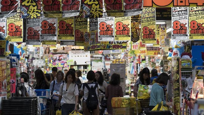 Shoppers in discount stores in Japan