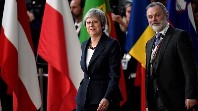 Theresa May arriving at EU summit