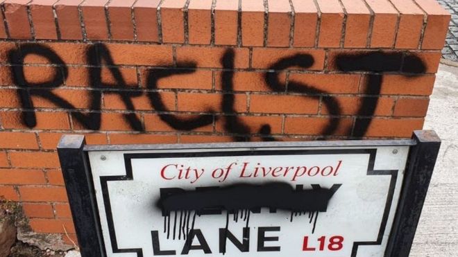 Defaced Penny Lane sign