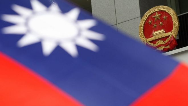 A Taiwan flag being displayed by a protester at the plaza in the new Central Government Office in Admiralty while protesters protest against the government appointed Secretary for Consitutional and Mailand Affairs Stephen Lam Sui-lung as the Chief Secretary. 09OCT11
