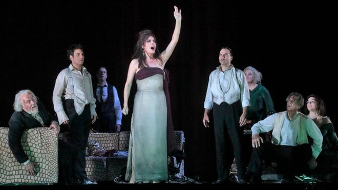 Audrey Luna (C) on stage with fellow cast members in The Exterminating Angel at New York's Metropolitan Opera