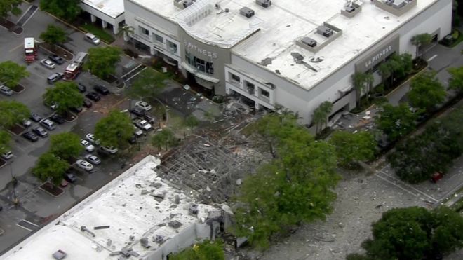 Aerial shot of LA fitness with debris outside