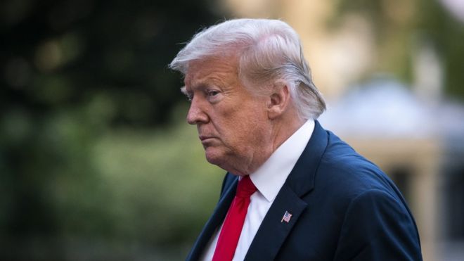 U.S. President Donald Trump walks to the White House residence after exiting Marine One on the South Lawn on June 25, 2020 in Washington, DC.