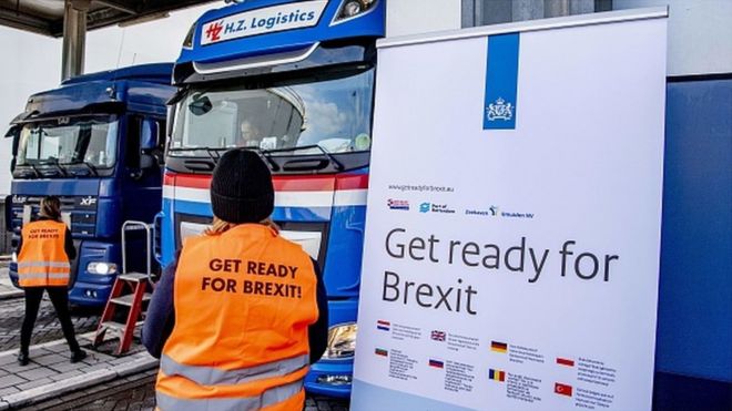 Flyers are distributed, as part of the Get Ready For Brexit campaign, to truck drivers at the terminal of a ferry operator in the port of Rotterdam