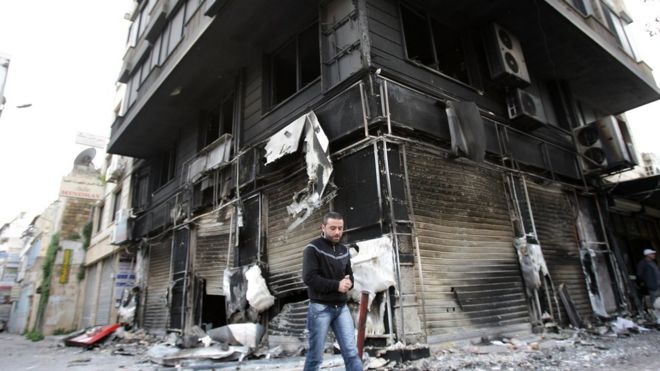 Ущерб от бомбежек в сирийском городе Латакия