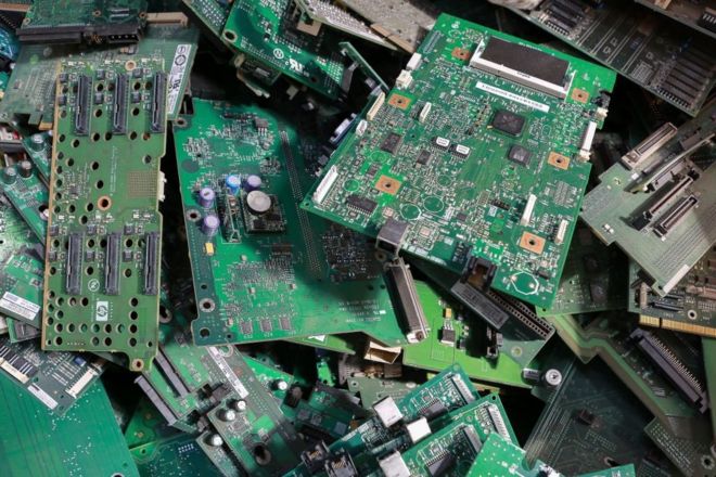 Discarded microchips at the Megapolisresurs recycling plant for household batteries, automotive batteries, and other disposed electronic products