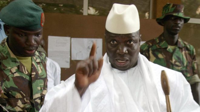 Yahya Jammeh, when president of The Gambia, shows his fingers with ink after casting his vote during the presidential elections 22 September 2006