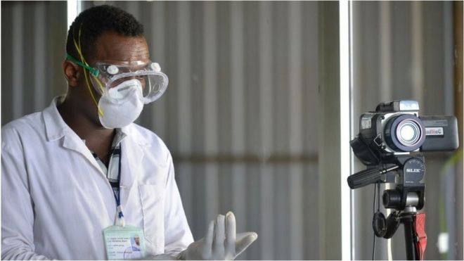 Medical staff for Ethiopia dey prepare to screen passenger