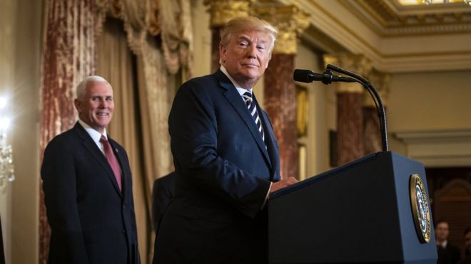 US President Donald J. Trump speaks before Mike Pompeo is sworn in as US Secretary of State, at the State Department, in Washington, DC, USA, 02 May 2018. US Vice President Mike Pence (background) looks on.
