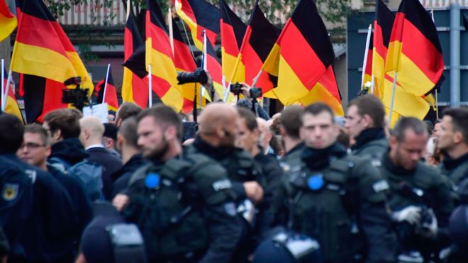 Photo of German policeman at rally in Chemnitz. File photo