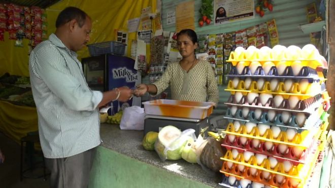 Paying by card at a market in india
