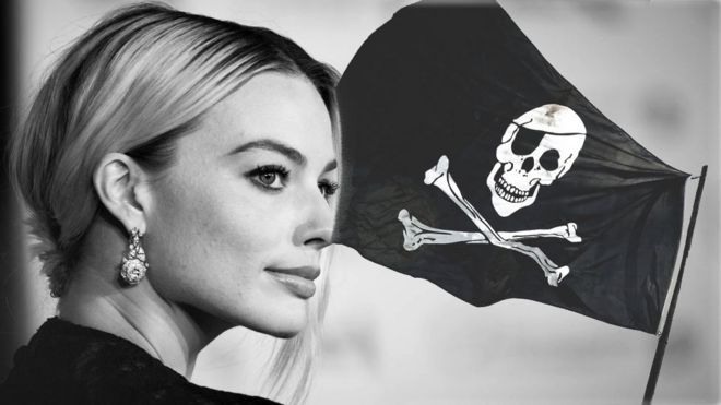 Margot Robbie and a pirate flag