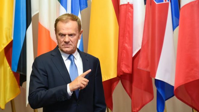 EU Council President Donald Tusk gestures as he arrives for a meeting with Slovakian Prime minister Robert Fico at the EU headquarters in Brussels on June 1, 2016.