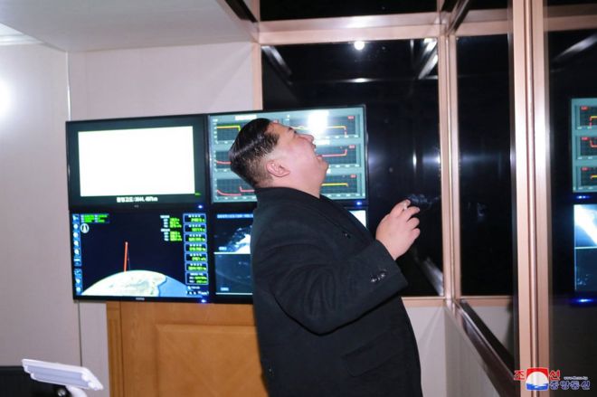 North Korea's leader Kim Jong Un is seen as the newly developed intercontinental ballistic rocket Hwasong-15's test was successfully launched, in this undated photo released by North Korea's Korean Central News Agency (KCNA) in Pyongyang 30 November 2017.