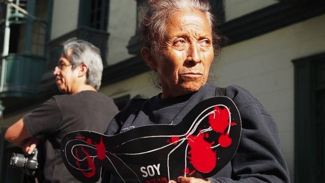 An indigenous woman demanding compensation during a protest in Lima, Peru in 2016