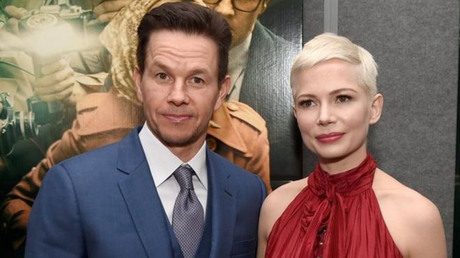 Mark Wahlberg (L) and Michelle Williams at the premiere of "All The Money In The World" on December 18, 2017 in Beverly Hills, California.