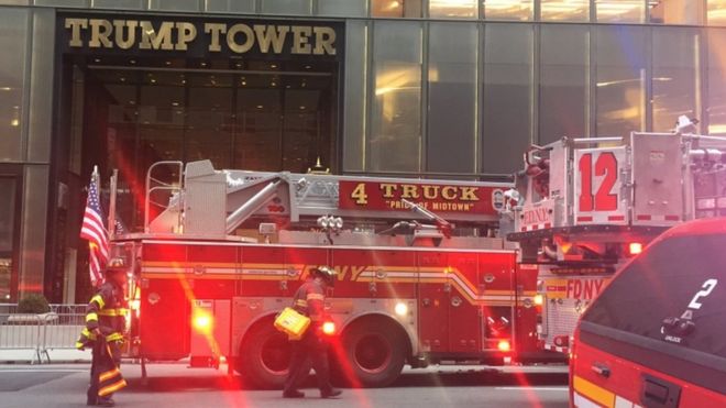 Fire trucks arrive outside Trump Tower on 5th Avenue in New York on April 7, 2018