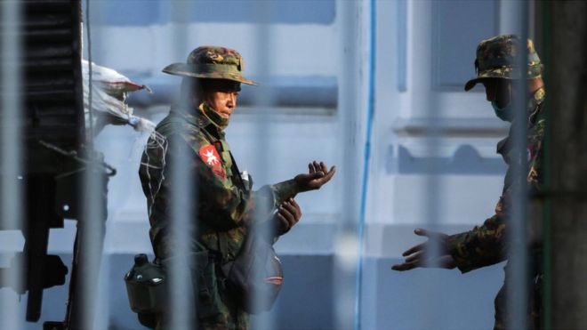 Myanmar soldiers are seen inside City Hall in Yangon, Myanmar February 1, 2021