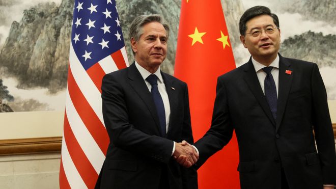 US Secretary of State Antony Blinken shakes hands with China's Foreign Minister Qing Gang on Sunday 18 June