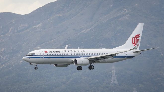A Boeing 737-89L passenger plane belonging to the Air China lands at Hong Kong International Airport on August 01 2018 in Hong Kong, Hong Kong.