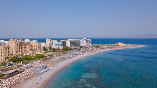 Image shows a beach in Rhodes