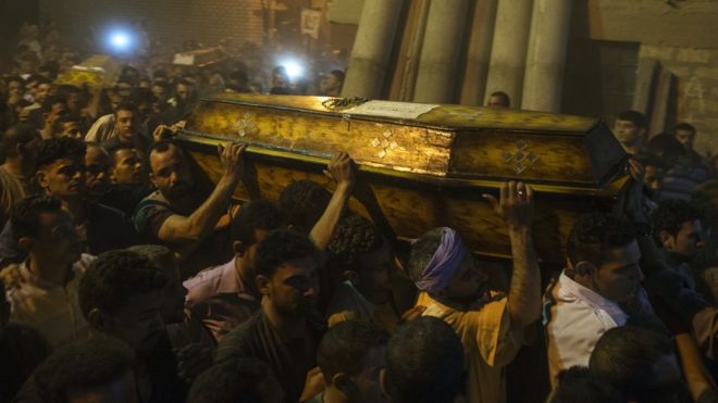 Mourners during the funeral of victims killed in an attack at the Monastery of St Samuel the Confessor, in Minya Province, central Egypt, 26 May 2017.