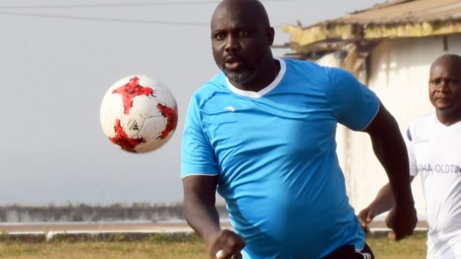 President George Weah playing football in Monrovia, Liberia