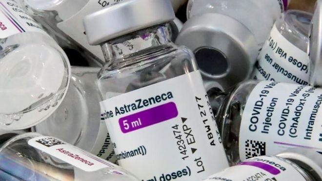 Empty vials of Oxford/AstraZeneca"s COVID-19 vaccine