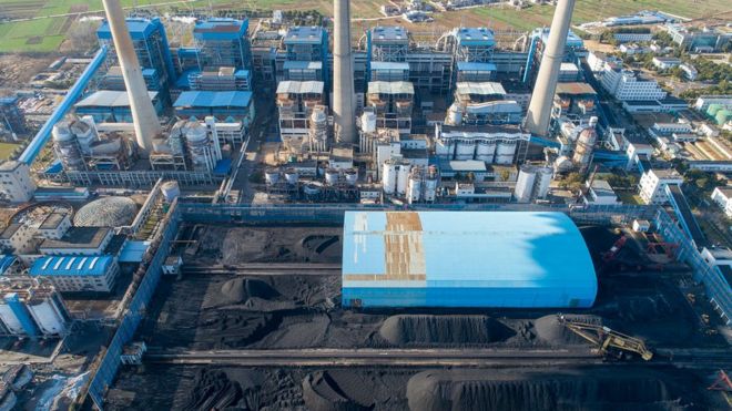 Aerial view of piles of coal at a coal-fired power station on December 30, 2020 in Xiangyang, Hubei Province of China