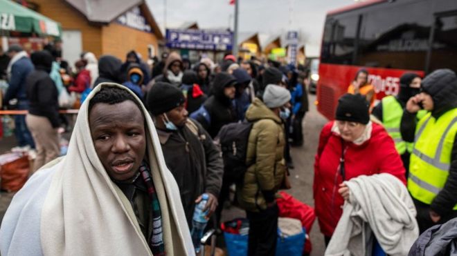 African nationals, mostly students of Ukrainian universities, at the Medyka pedestrian border crossing.