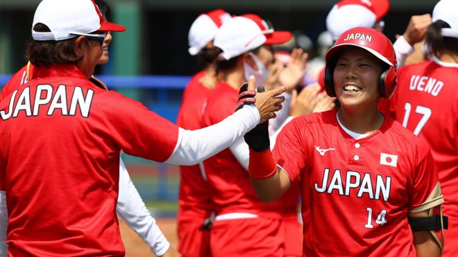 Team Japan celebrate their victory over Australia