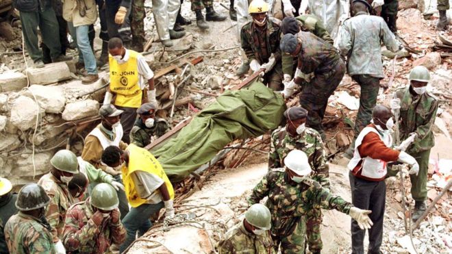 Stretcher being pulled out of the rubble