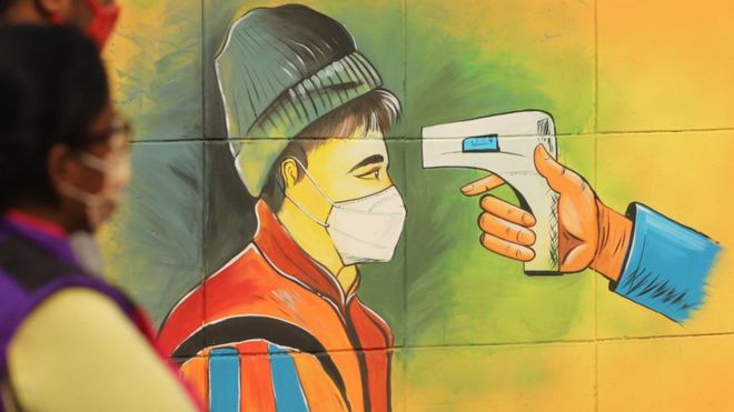 A mural in Delhi showing temperature testing