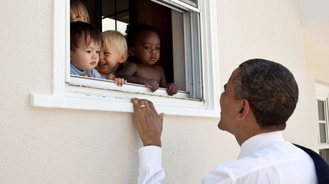 President Obama smiles at children in Maryland