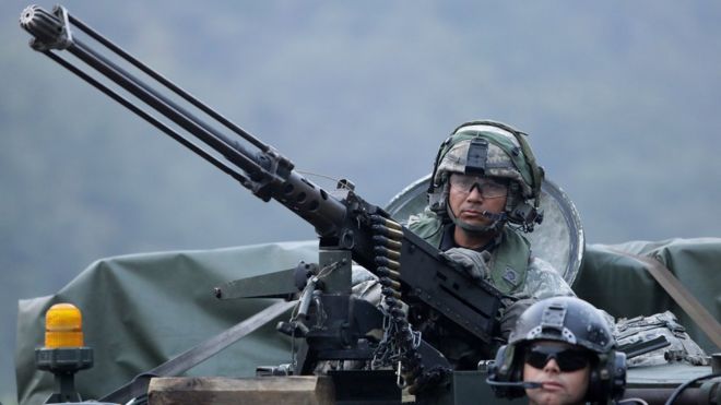 U.S. soldiers on M113 armored vehicles take part during the Warrior Strike VIII exercise at the Rodriguez Range on September 19, 2017 in Pocheon, South Korea.