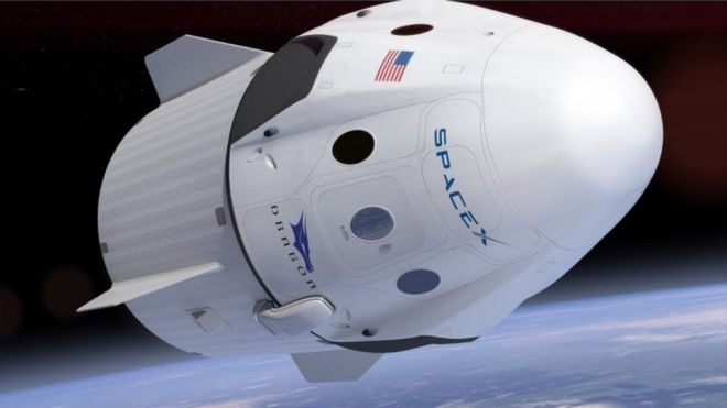 A rendition of Crew Dragon's capsule flying above Earth