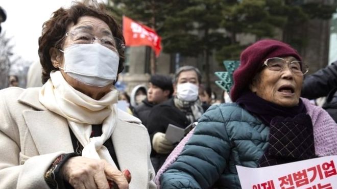 Lee Yong-soo (L), who was sexually enslaved by Japan"s World War II military, and Yang geum-deok (R), plaintiff, "Victim of Forced Labor of Mitsubishi Heavy Industries during World War II", attend an event marking the 104th anniversary of the 01 March Independence Movement, in Seoul, South Korea, 01 March 2023.