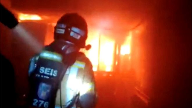 Firefighter enters club blaze