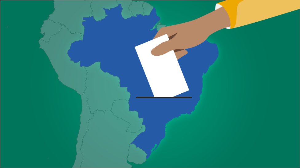 Ilustração mostra uma mão votando - ao fundo, um mapa do Brasil
