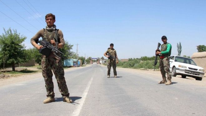 Afghan National Army troops keep guard during a gunfight in Kunduz province